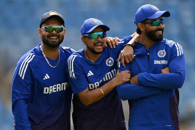 Kuldeep Yadav with teammates during a break.