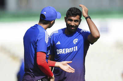 Gill and Bumrah in discussion during England nets session