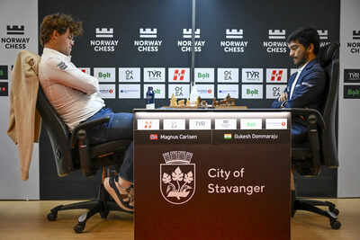 Magnus Carlsen and D Gukesh facing off at Norway Chess 2025