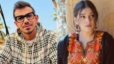 Yuzvendra Chahal smiles, potentially hinting at his relationship status.