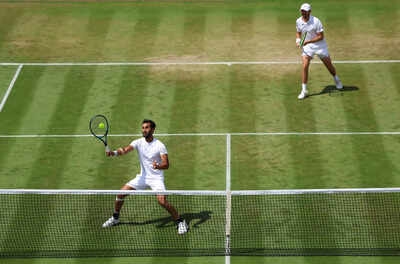 Yuki Bhambri playing a forehand at Wimbledon