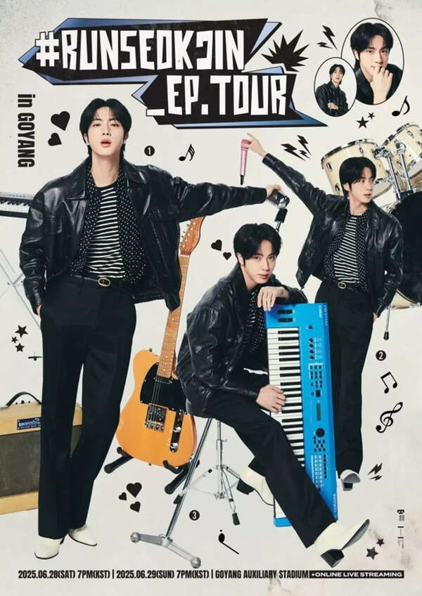 Jin waving to the crowd at his concert